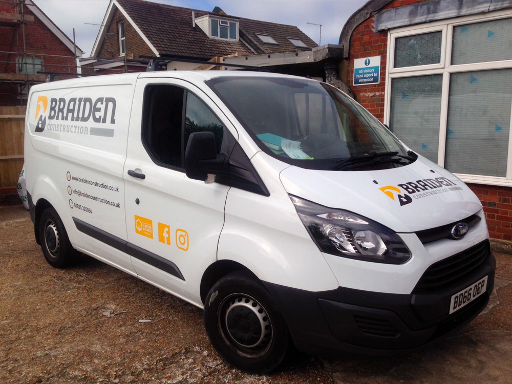 Signwritten white van with decals for Braiden construction