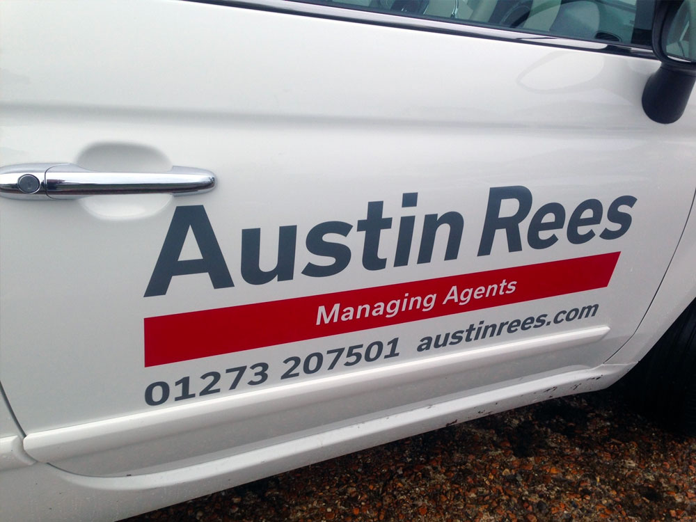 Van decals in dark grey and red for Managing Agents Austin Rees